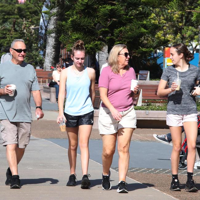 Surfers Paradise wakes up to its first day in lockdown due to the latest Covid-19 scare. Crowds walking around Surfers Paradise without masks. Picture Glenn Hampson