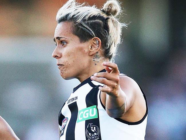 MELBOURNE, AUSTRALIA - FEBRUARY 02:  Moana Hope of the Magpies kicks the ball during the round one AFLW match between the Carlton Blues and the Collingwood Magpies at Ikon Park on February 2, 2018 in Melbourne, Australia.  (Photo by Michael Dodge/Getty Images)