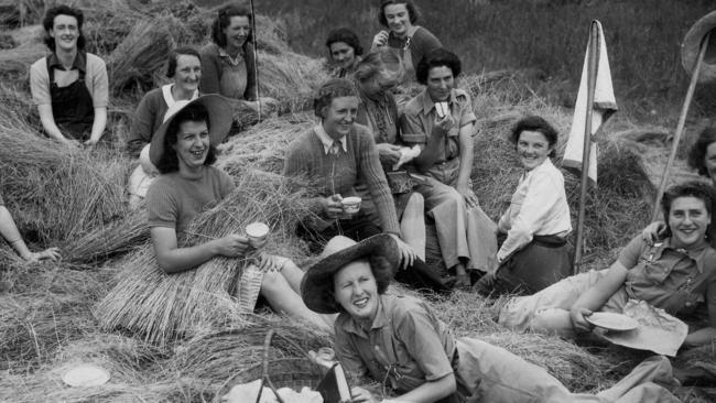 A team of workers in a flax field at Colac take a break on their shift during World War II. Governments have a responsibility to prepare a jobs strategy for the post-COVID period, the same way as they did after World War II.