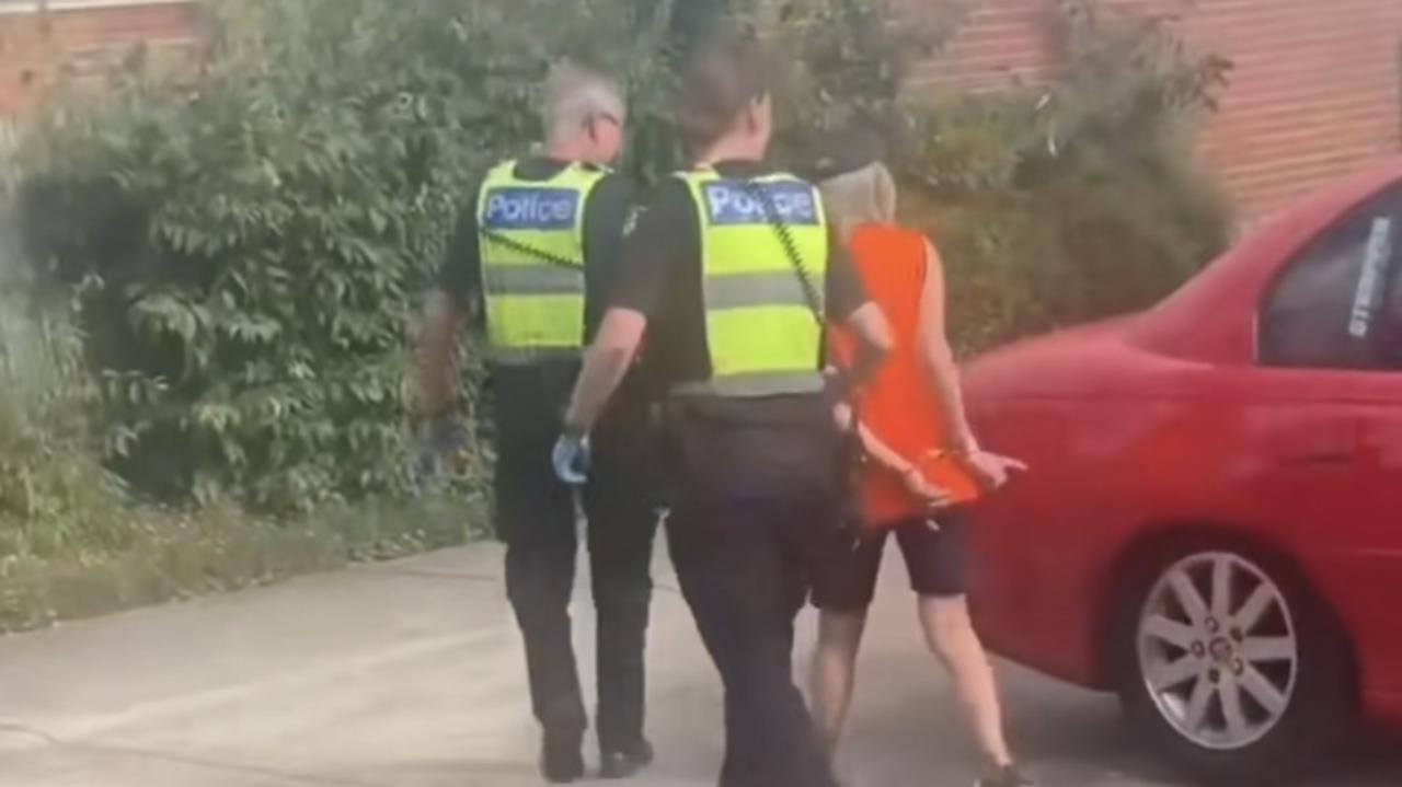 A woman is arrested in Newtown in December 2022 after the remains of a body was found inside her unit. Photo: Emily Drought TikTok.