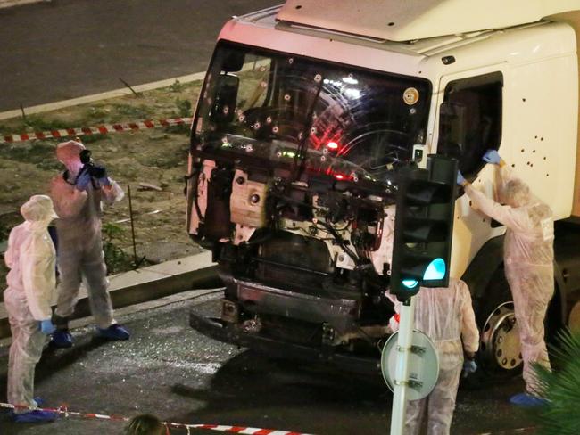 Authorities investigate the truck that ploughed through Bastille Day revellers in the French resort city of Nice, France. Picture: Sasha Goldsmith