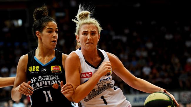 Adelaide Lightning star Lauren Nicholson, driving against Kia Nurse of the Canberra Capitals in Saturday’s grand final, is the WNBL’s defensive player of the year. Picture: Tracey Nearmy/Getty Images