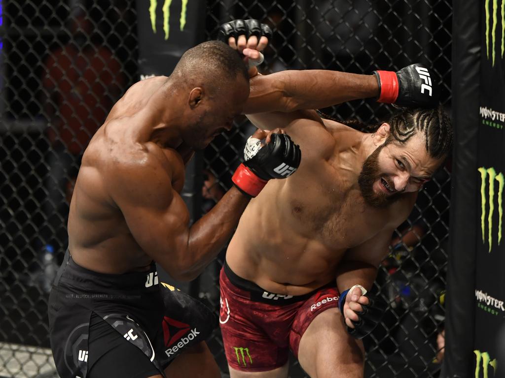 Jorge Masvidal punches Kamaru Usman. (Photo by Jeff Bottari/Zuffa LLC)