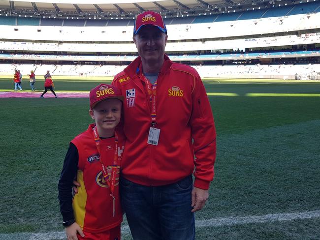 Zac Broughton (left) with father Richard Broughton at the MCG for the Gold Coast Suns Round 20 AFL game against Melbourne. Picture: Supplied.