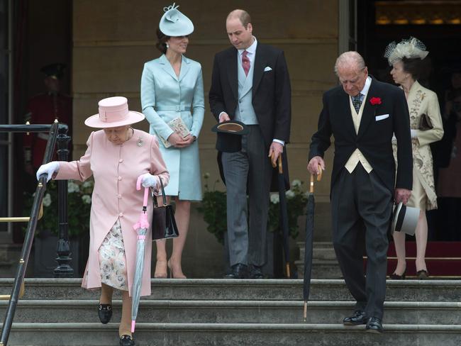 Britain’s Queen Elizabeth II, Britain’s Catherine, Duchess of Cambridge, Britain’s Prince William, Duke of Cambridge, Britain’s Prince Philip, Duke of Edinburgh and Britain’s Princess Anne, Princess Royal, attend a garden party at Buckingham Palace in London on May 16, 2017. Picture: AFP
