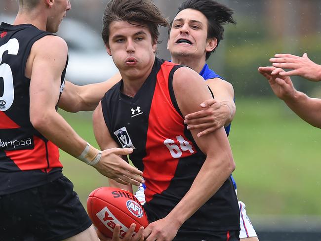 VFL: Essendon v Footscray. (L-R) EssendonÃs Olly Lewry and Wade Derksen and FootscrayÃs Nick Baltas, Cody Weightman and Ned Nichols. Picture: Josie Hayden