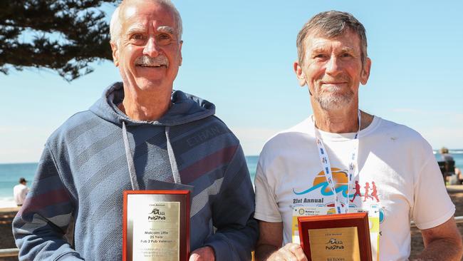 Malcolm Little and Bill Eccles were awarded for running in every event, during the 25th Annual Pub2Pub fun run in 2017. Picture: Julian Andrews