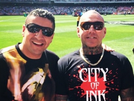 Kazem Hamad (left) at the footy with Toby Mitchell. Picture: Instagram