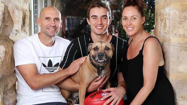 Tyson Edwards with son Luke, wife Mandy and dog Junior after Luke was drafted by West Coast in 2020. Picture: Sarah Reed