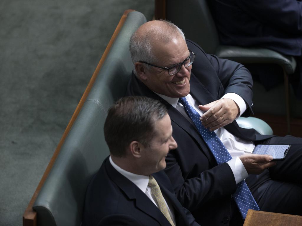 Mr Morrison and Mr Hawk were photographed laughing together on Tuesday. Picture: NCA NewsWire / Gary Ramage