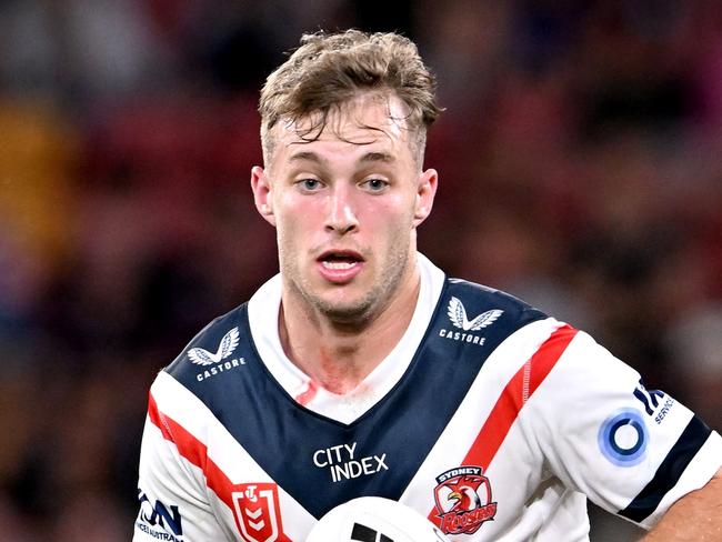 BRISBANE, AUSTRALIA - APRIL 08: Sam Walker of the Roosters looks to takes on the defence during the round five NRL match between the Brisbane Broncos and the Sydney Roosters at Suncorp Stadium, on April 08, 2022, in Brisbane, Australia. (Photo by Bradley Kanaris/Getty Images)