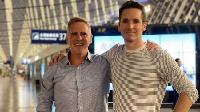 The Australian Financial Review's Michael Smith, left, and the ABC's Bill Birtles flew out of Shanghai on Monday night.