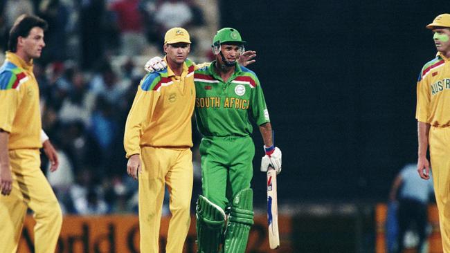 Kepler Wessells of South Africa is congratulated by Dean Jones of Australia.