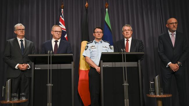 Home Affairs Minister Tony Burke, left, Anthony Albanese, Australian Federal Police Commissioner Reece Kershaw, Attorney-General Mark Dreyfus and ASIO director-general Mike Burgess in Canberra on Monday. Picture: NewsWire / Martin Ollman