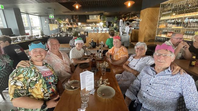 (L-R) Jack, David, Cate, Mardi, Roberta and Ralph Laurie enjoying Christmas Day at the Wharf One in Darwin, 2022. Picture: Annabel Bowles