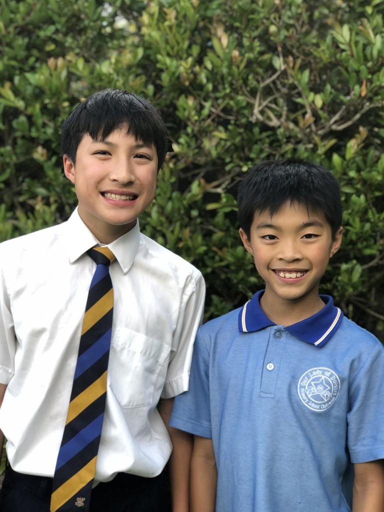 Junior journalists Jonathan and Joseph Tan are big fans of Mackenzie Little javelin skills as well as her famous cinnamon scrolls. Picture: supplied