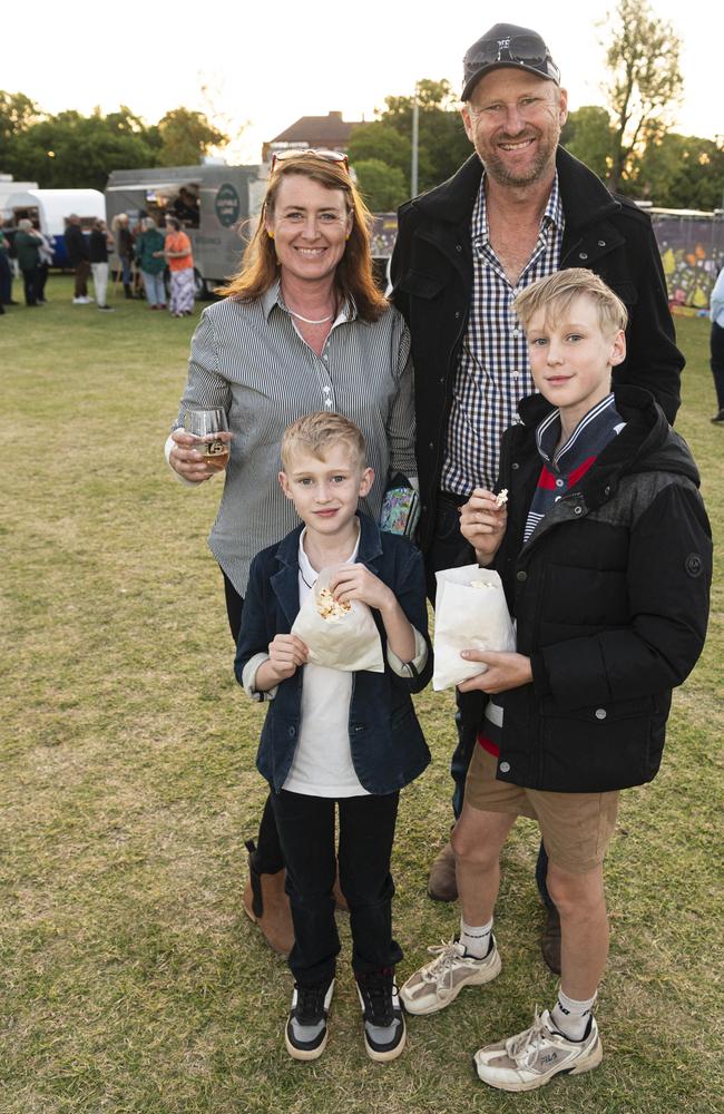 Brigid and Don Groves with their sons Hagen (left) and Spencer at the Symphony Under the Stars concert performed by the Queensland Symphony Orchestra in Queens Park Amphitheatre for Carnival of Flowers, Friday, October 4, 2024. Picture: Kevin Farmer