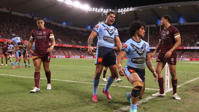 TOWNSVILLE, AUSTRALIA - JUNE 09:  Brian To'o of the Blues scores a try during game one of the 2021 State of Origin series between the New South Wales Blues and the Queensland Maroons at Queensland Country Bank Stadium on June 09, 2021 in Townsville, Australia. (Photo by Mark Kolbe/Getty Images)