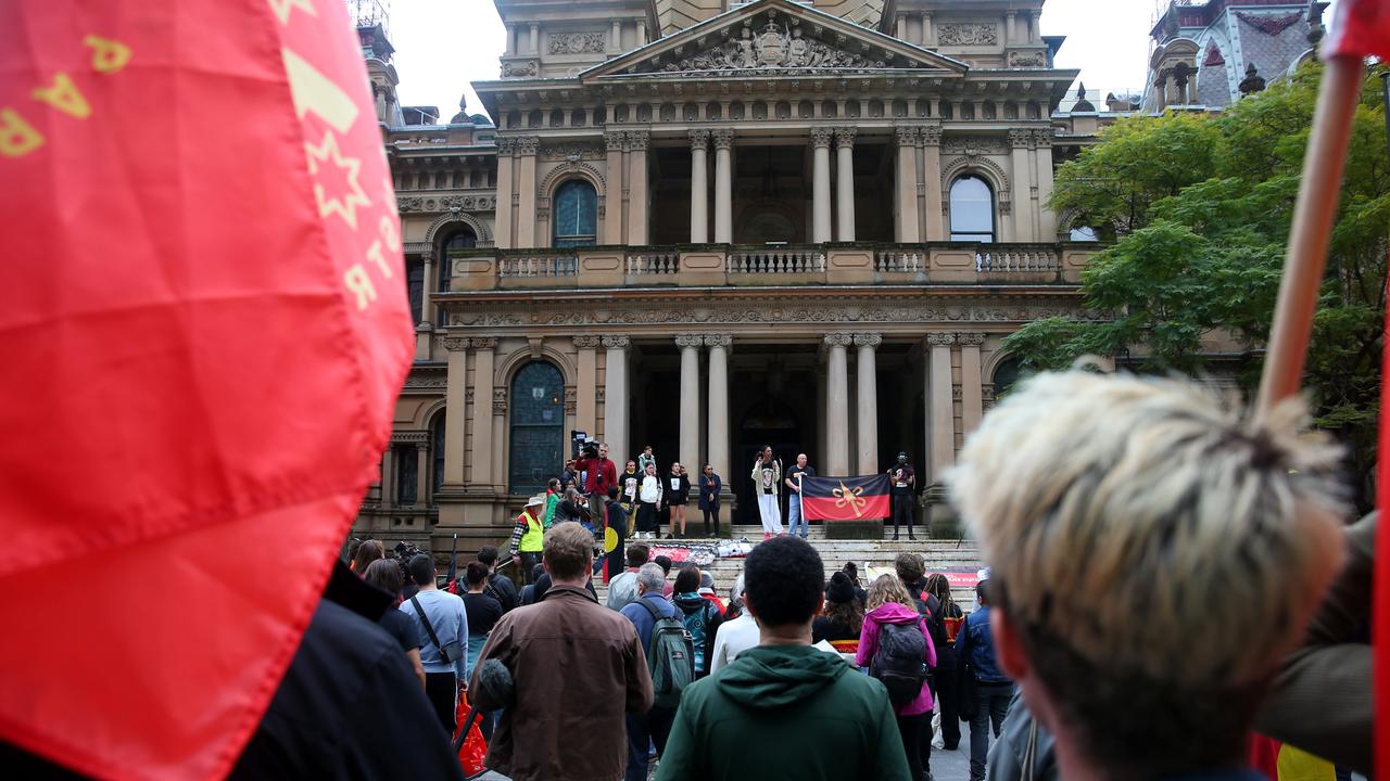 Protestors at the Abolish the Monarchy protest at Town Hall in Sydney. Picture: NCA NewsWire / Nikki Short