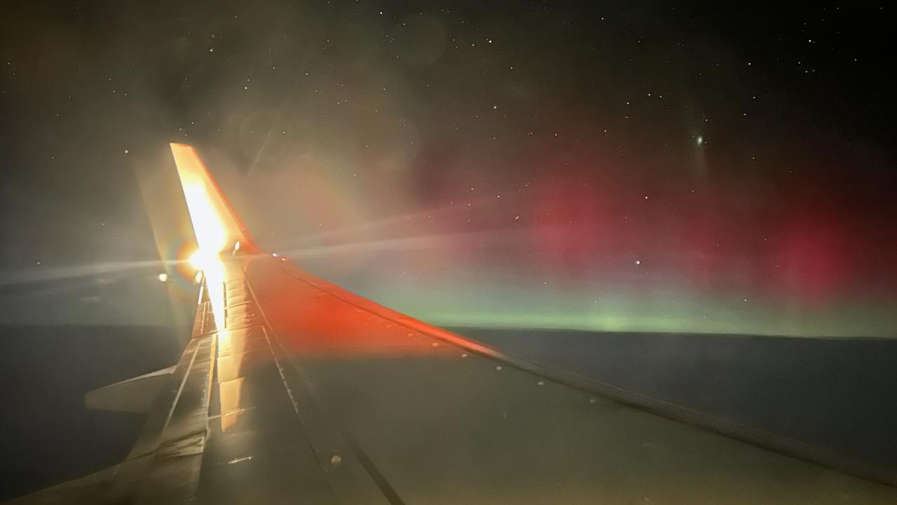 Aurora australis lights up the South Australian sky. Live view from 38,000 feet as a plane descends into Adelaide. Picture: Gemma Jones