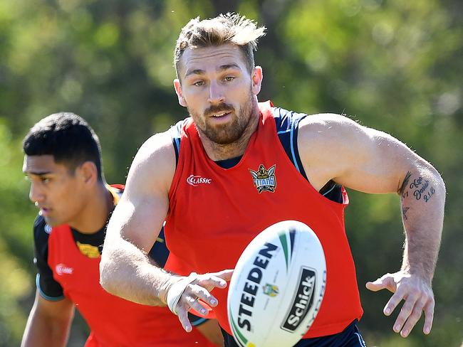 Bryce Cartwright looks on during the Gold Coast Titans training session on the Gold Coast, Tuesday, August 14, 2018. (AAP Image/Dave Hunt) NO ARCHIVING