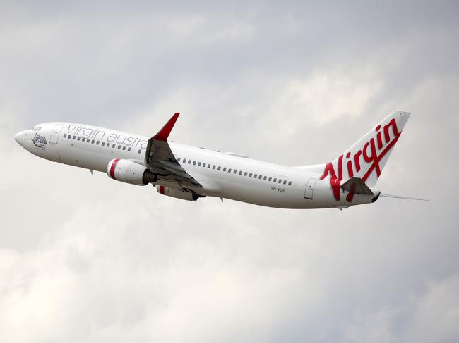 A Virgin Australia plane takes off from Sydney Airport. Picture: NCA NewsWire / Christian Gilles