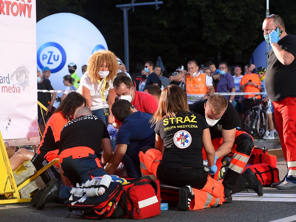 Medics help Fabio Jakobsen after Wednesday’s crash.