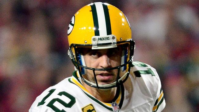 GLENDALE, AZ - JANUARY 16: Quarterback Aaron Rodgers #12 of the Green Bay Packers gestures during the first half of the NFC Divisional Playoff Game against the Arizona Cardinals at University of Phoenix Stadium on January 16, 2016 in Glendale, Arizona. Jennifer Stewart/Getty Images/AFP == FOR NEWSPAPERS, INTERNET, TELCOS & TELEVISION USE ONLY ==