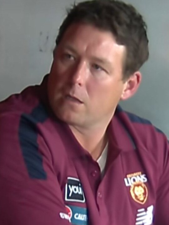 Stuart Dew in the Brisbane coaches box.