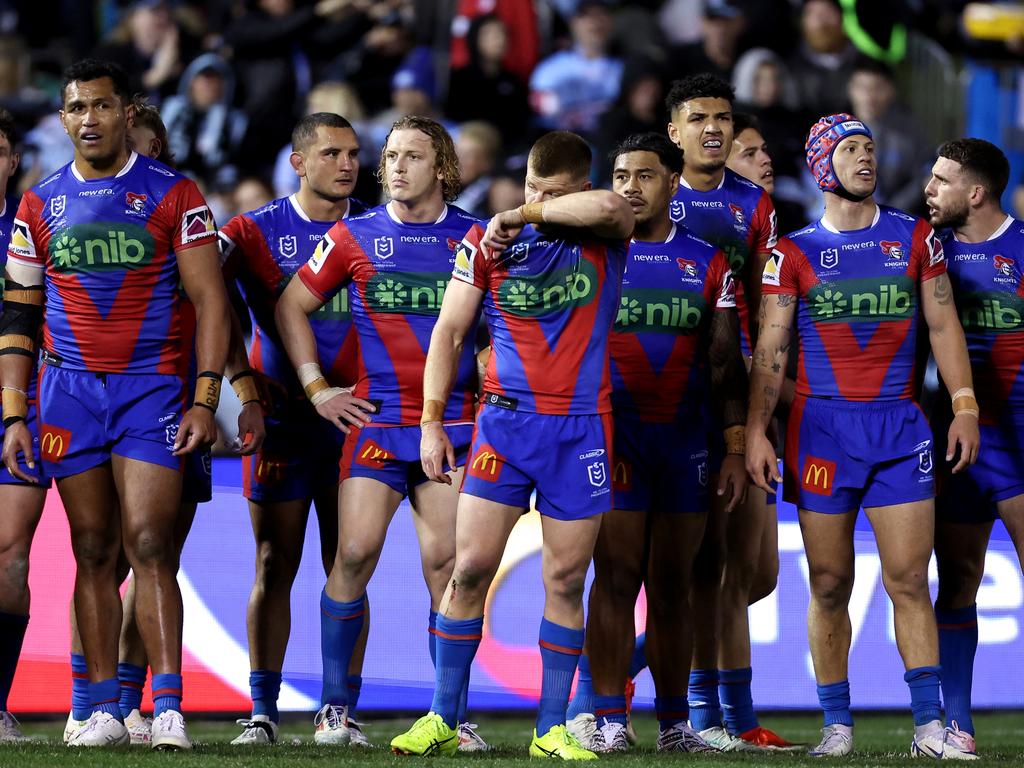SYDNEY, AUSTRALIA - AUGUST 18: Knights players react during the round 24 NRL match between Cronulla Sharks and Newcastle Knights at PointsBet Stadium, on August 18, 2024, in Sydney, Australia. (Photo by Brendon Thorne/Getty Images)