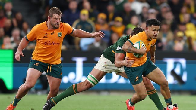 SYDNEY, AUSTRALIA – SEPTEMBER 03: Hunter Paisami of the Wallabies is tackled during The Rugby Championship match between the Australia Wallabies and South Africa Springboks at Allianz Stadium on September 03, 2022 in Sydney, Australia. (Photo by Mark Metcalfe/Getty Images)