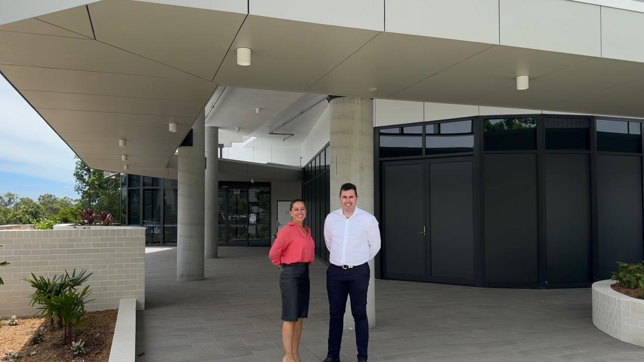 Renee Hughes and Bede Blatchford from Colliers Gold Coast at the Proxima building.