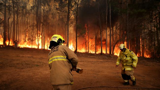 Firefighters have been doing everything they can to battle the fires burning in the state’s north. Picture: Nathan Edwards.