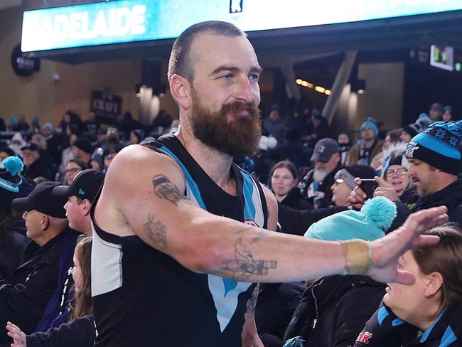 ADELAIDE, AUSTRALIA - JULY 20: Charlie Dixon of the Power with fans after the win during the 2024 AFL Round 19 match between the Port Adelaide Power and the Richmond Tigers at Adelaide Oval on July 20, 2024 in Adelaide, Australia. (Photo by Sarah Reed/AFL Photos via Getty Images)