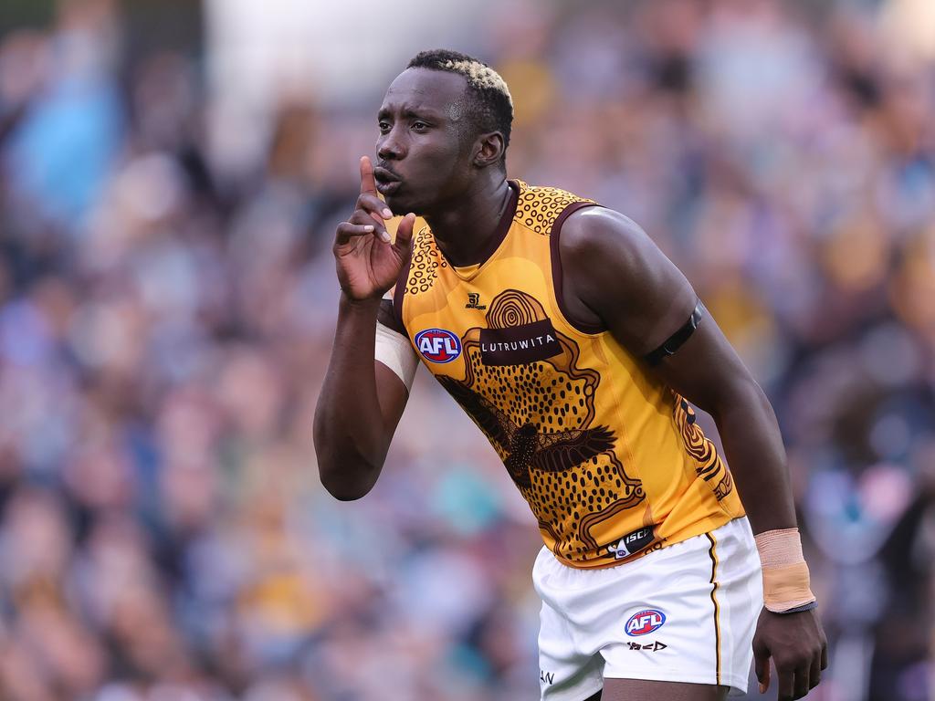 Mabior Chol and the Hawks silenced the crowd at the Adelaide Oval on Sunday. Picture: Sarah Reed/AFL Photos via Getty Images.