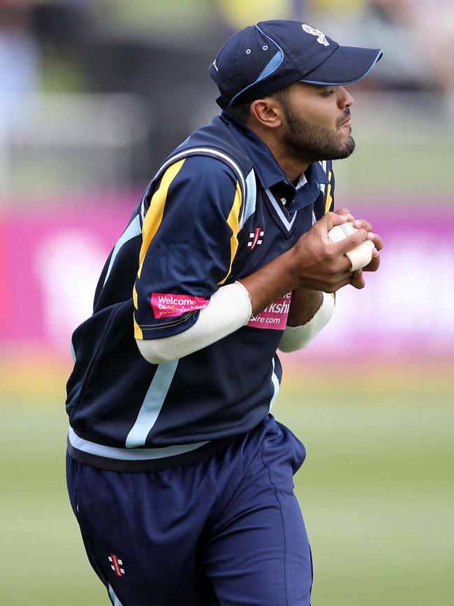 Azeem Rafiq takes a catch for Yorkshire in 2012. Picture AFP