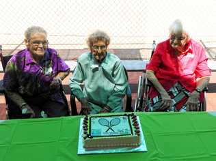 REUNITED: Glenys Brewer 93, Mavis Burns 96 and Kath Keleher 94 cut the cake at the Dalby Ladies Midweek Tennis reunion. Picture: Janet Hutchinson