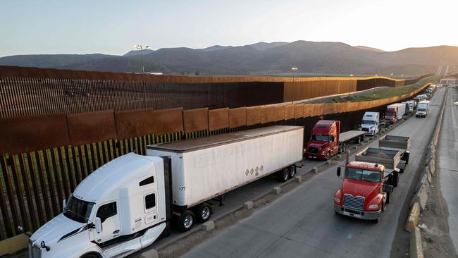 Trucks queue near the Mexico-US border on March 4. Picture: AFP