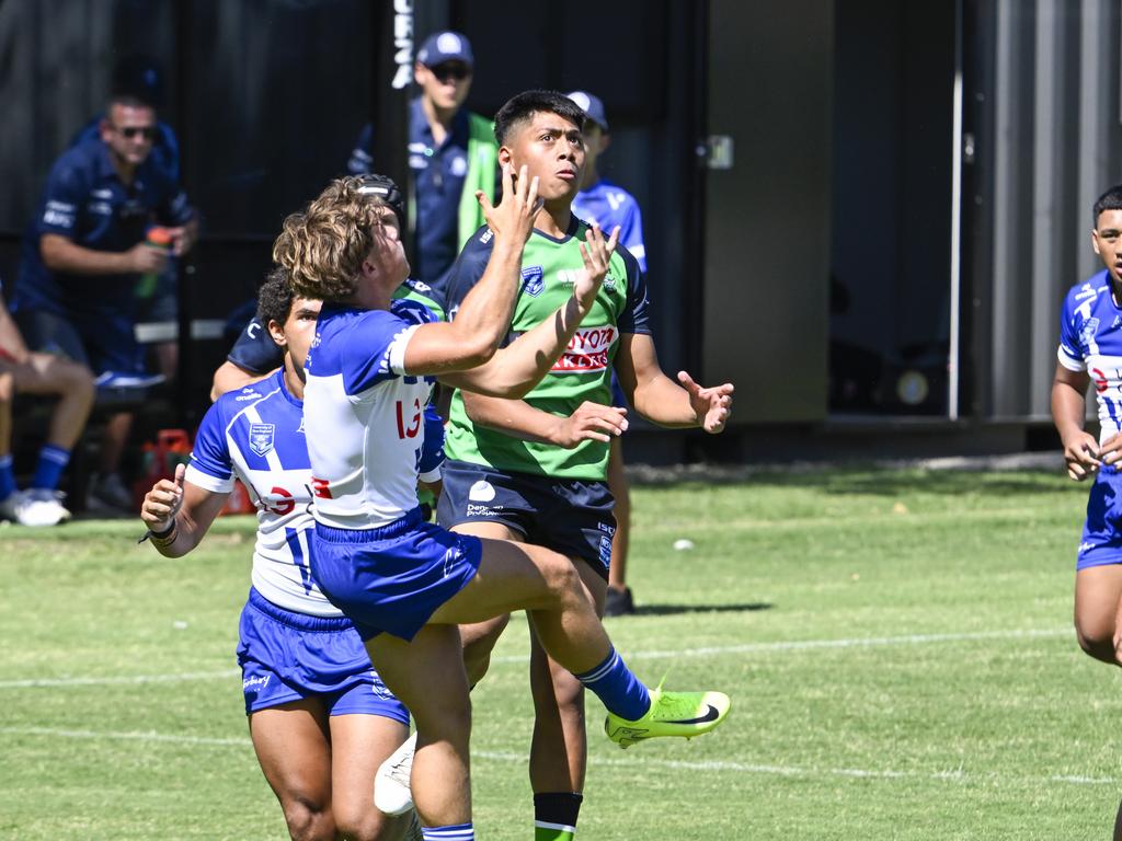 Jai Callaghan leaps for the ball. Picture: Martin Ollman