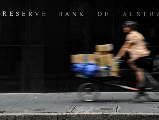 A pedestrian walks past the Reserve Bank of Australia (RBA) building in Sydney, Tuesday, March 3, 2020. The Reserve Bank is expected to cut the cash rate to a new record low 0.5 per cent on Tuesday. (AAP Image/Joel Carrett) NO ARCHIVING