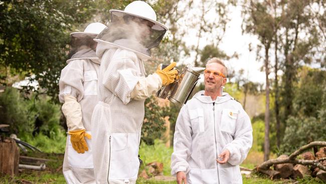 Hamish Ta-mé showing people his beehives. Picture: Supplied