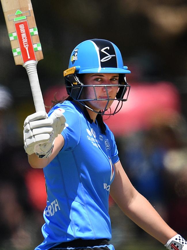 Strikers No. 3 batter Tahlia McGrath raises her bat after reaching her half-century against Perth Scorchers. Picture: AAP