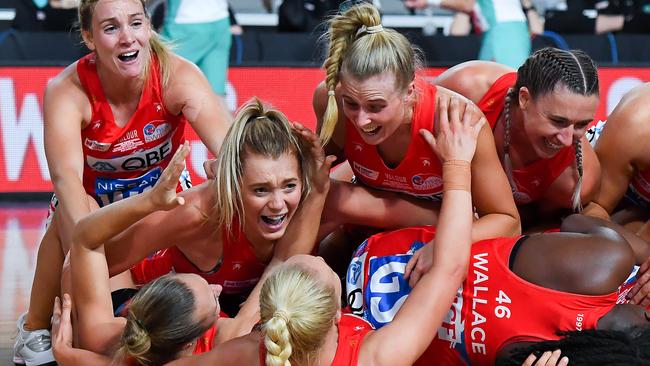 The Swifts celebrating their second Super Netball crown.