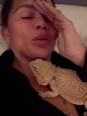 Chrissy Teigen with her bearded dragon, Sebastian. Picture: Supplied