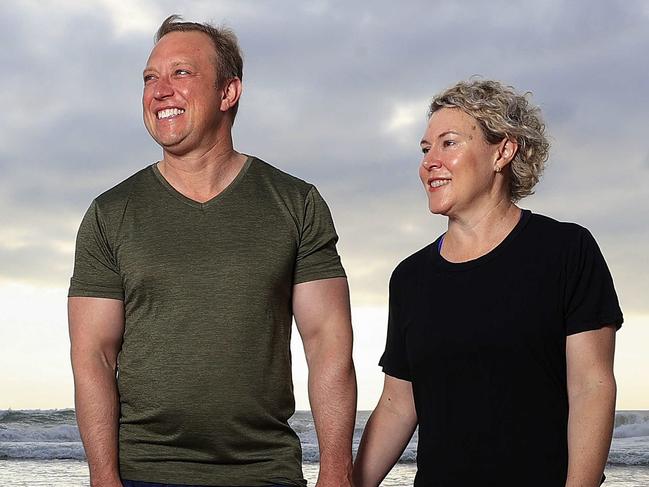 Premier Steven Miles and his wife Kim enjoy a quiet start to the day at the beach near Marcoola on the Sunshine Coast before hitting the election trail again. Pics Adam Head