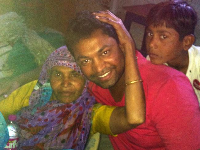 Saroo with his biological mother Kamla and sibling Sahkila back home in India.