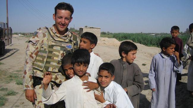 Newly-preselected Liberal candidate for Mackellar, James Brown, during his time in Iraq with the Australian army. Images: supplied