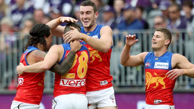 Lewis Taylor is congratulated by teammates after kicking a goal. Pic: AAP