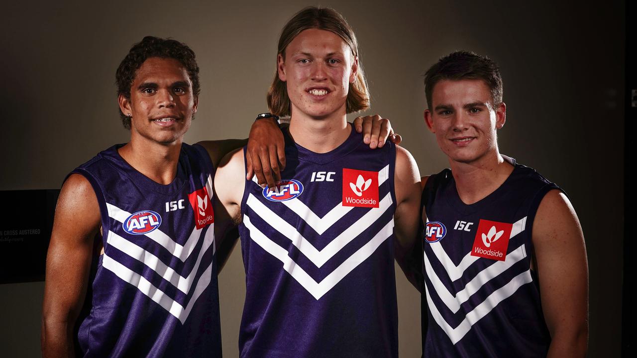 Liam Henry, Hayden Young, and Caleb Serong all joined Fremantle across three consecutive top ten picks. (AAP Image/Scott Barbour)