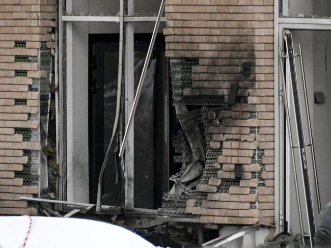 A view of the blast scene, which killed the commander of Russian armed forces' chemical, biological and radiation defence troops, Igor Kirillov, and his deputy, according to the Russian Investigative Committee, outside a residential building on Ryazansky Avenue in Moscow on December 17, 2024. (Photo by Alexander NEMENOV / AFP)